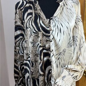 Women’s animal print blouse. Size S.